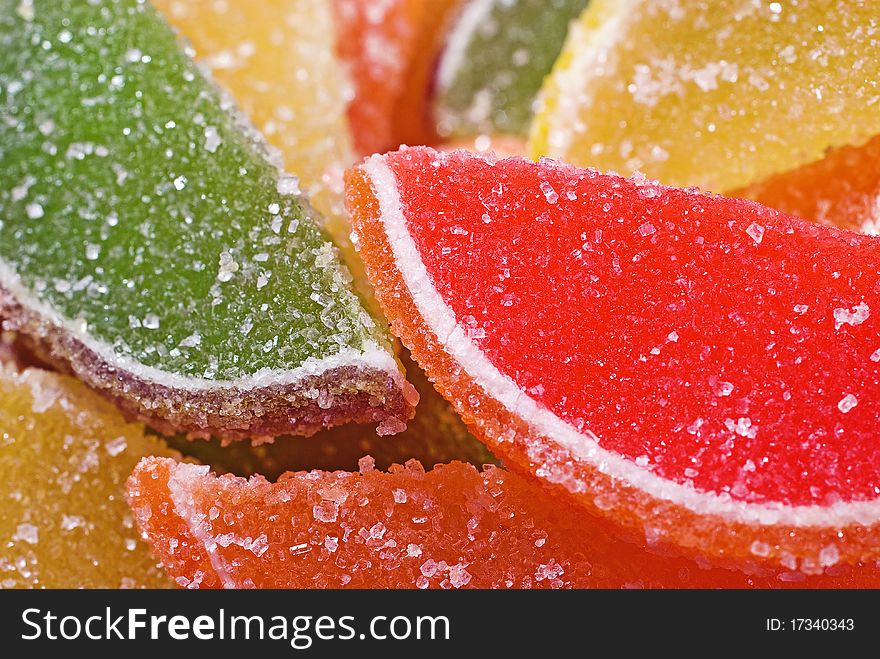 Citric segments in sugar, close-up