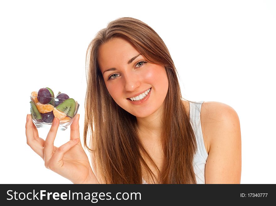 Beautiful woman with fruit on a white background