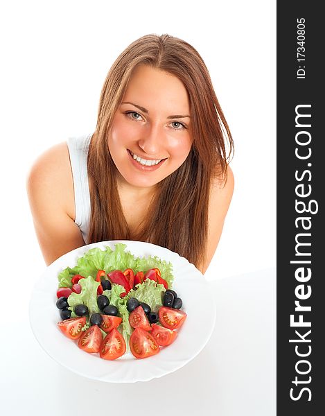 Beautiful woman with vegetables on a white background