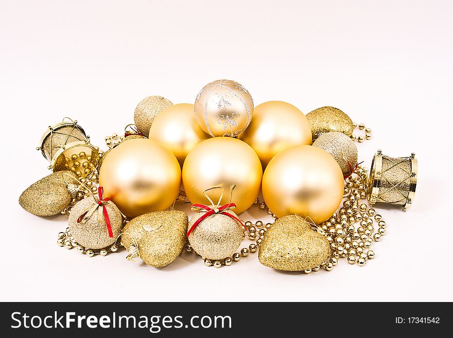 Golden Christmas ornament on white background. Golden Christmas ornament on white background