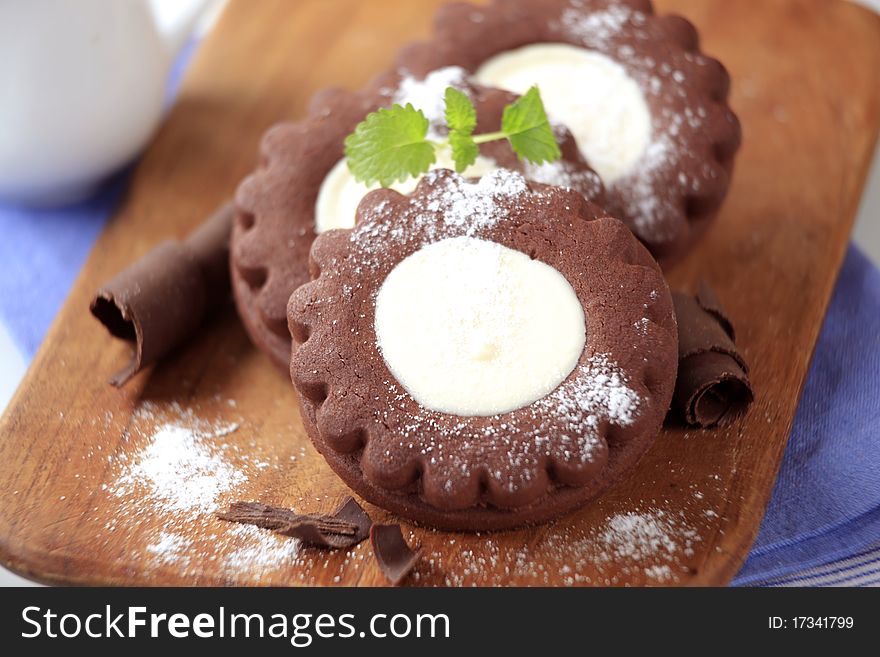 Chocolate sandwich cookies with vanilla cream filling