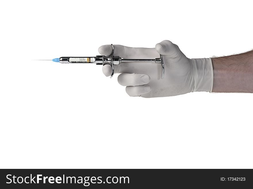 Medical Syringe hold by human hand. Isolated on white background