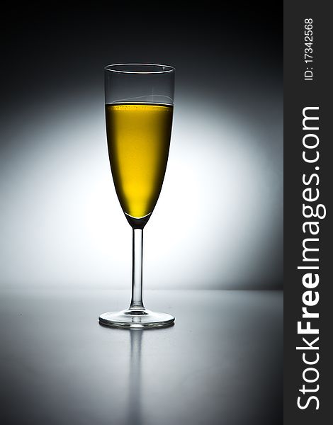 Glass of champagne with backlight