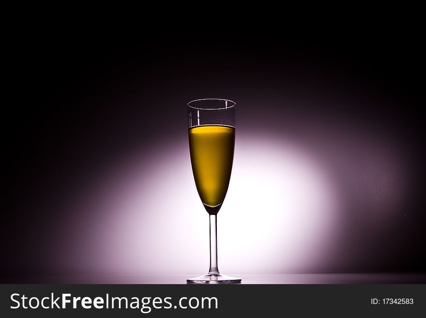 Glass of champagne with backlight