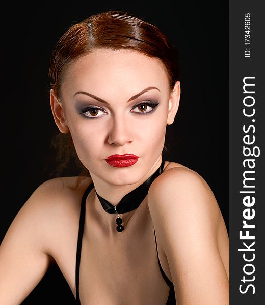 Expressive woman with  ruby red lips and dark magnetic eyes. Expressive woman with  ruby red lips and dark magnetic eyes