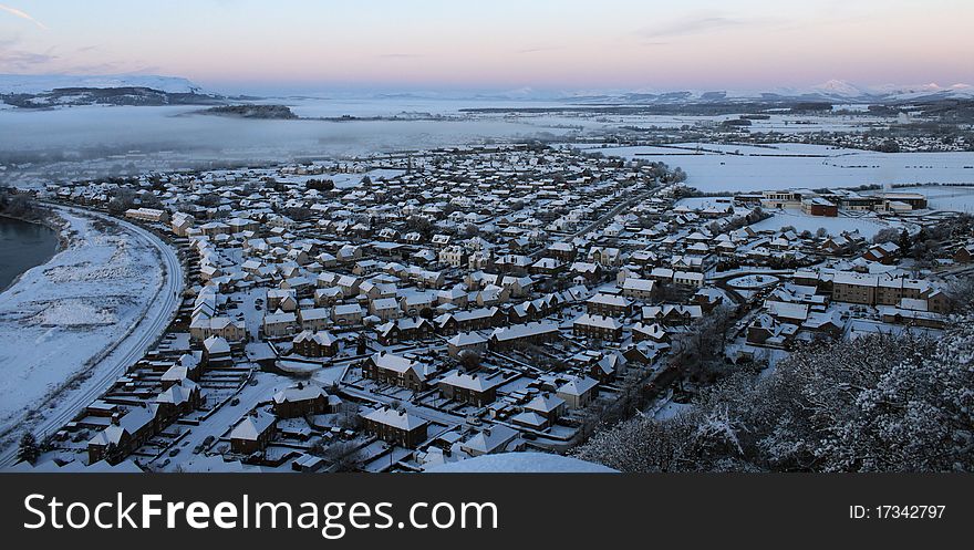 A town covered in thick snow during winter. A town covered in thick snow during winter