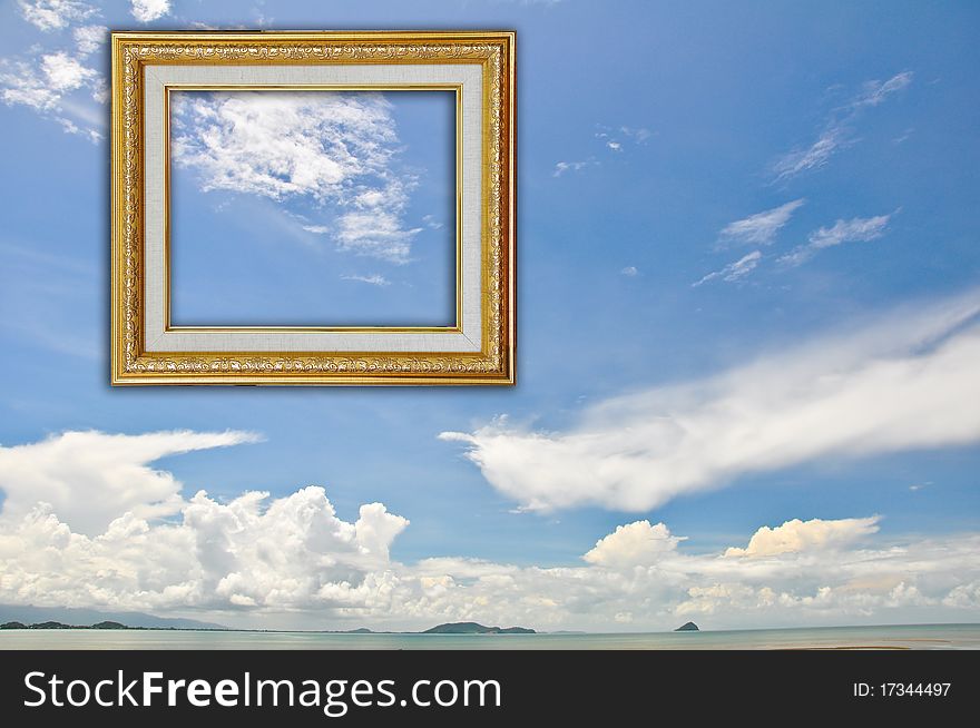Gold Picture Frame on Blue Sky Background