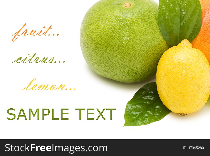 Fresh juicy grapefruits with green leafs. Isolated