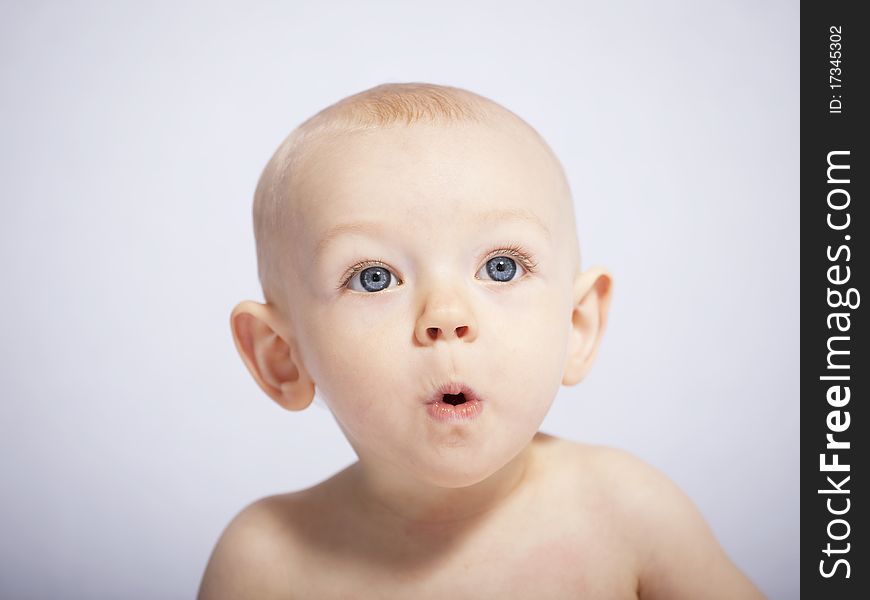 Little baby makes a puzzled expression, her first photo session. Little baby makes a puzzled expression, her first photo session