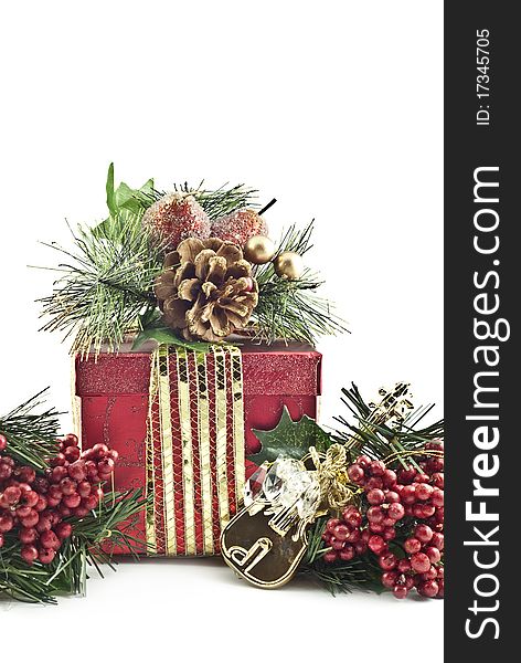 Beautiful Christmas present with decorations on a white background, copy space