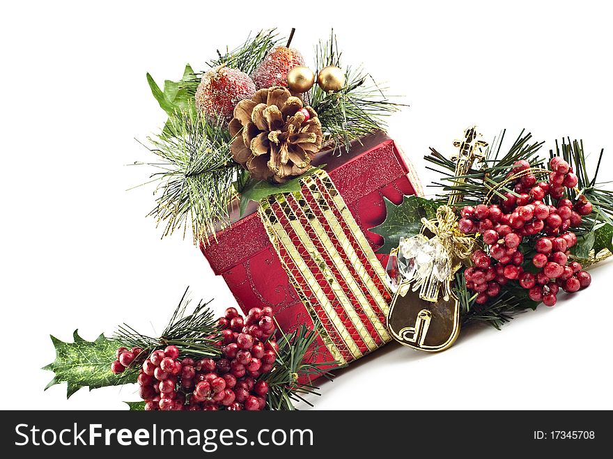 Beautiful holiday present with decorations on a white background, copy space