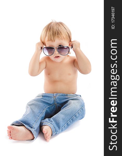 Little boy with sunglasses on a white background. Little boy with sunglasses on a white background