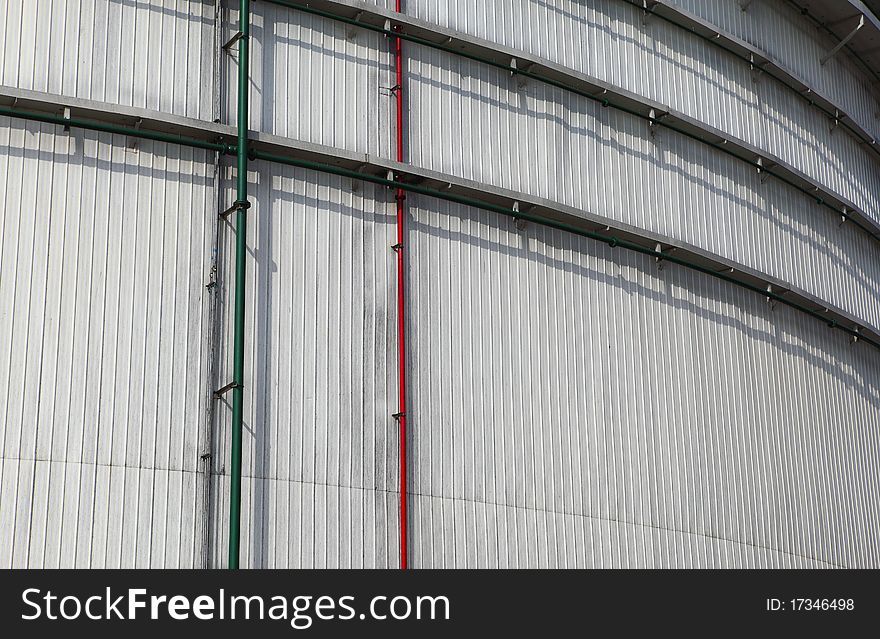 The storage tanks at an oil refinery complex. The storage tanks at an oil refinery complex