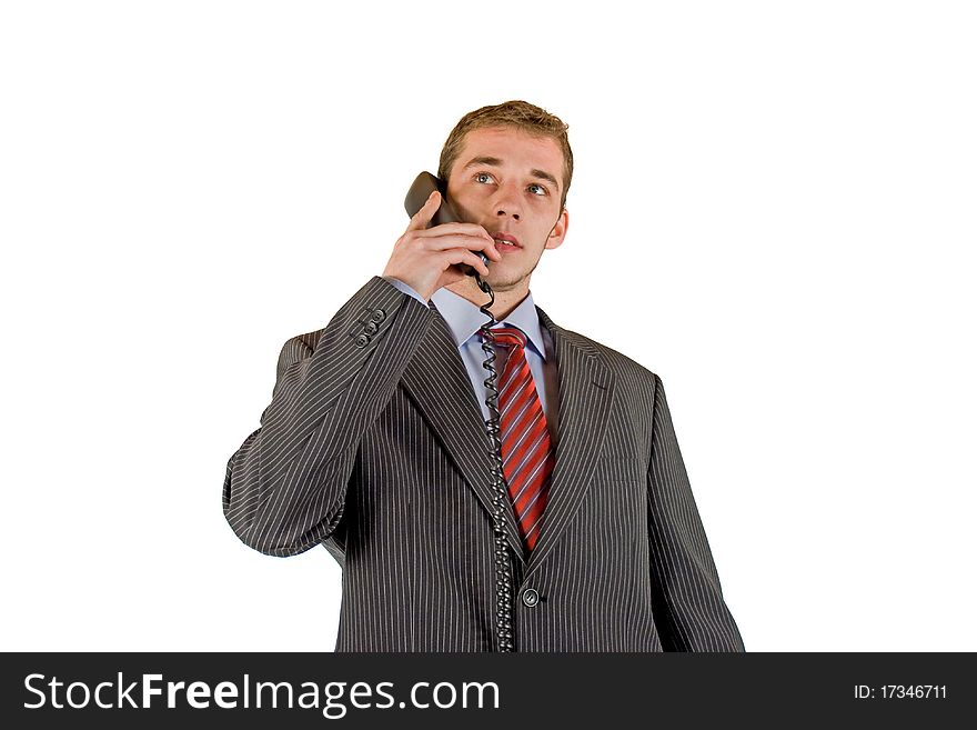 Young handsome businessman is telephoning. Young handsome businessman is telephoning