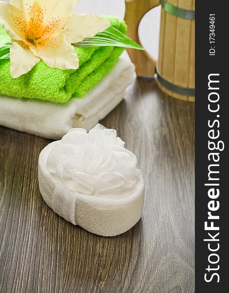 composition of a bath accessories on wooden background