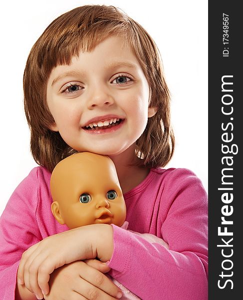 Happy little girl portrait with toy - doll isolated on white. Happy little girl portrait with toy - doll isolated on white