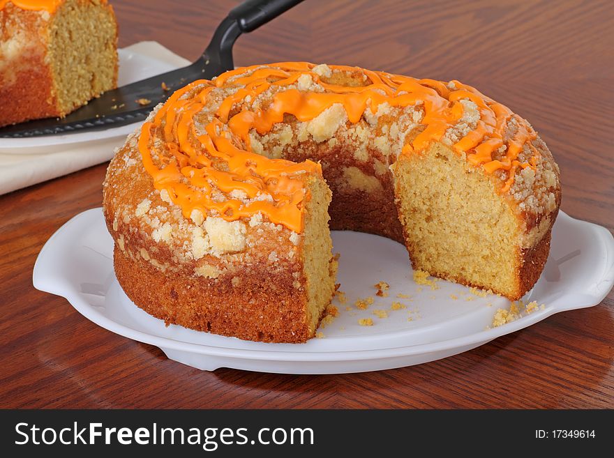 Sliced pumpkin cake on a cake platter