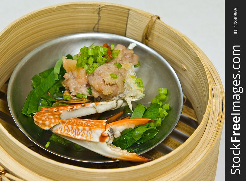 Chinese steamed dimsum in bamboo containers traditional cuisine. Chinese steamed dimsum in bamboo containers traditional cuisine