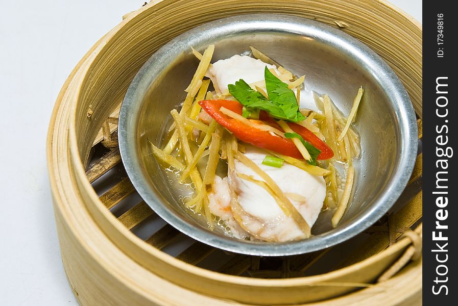 Chinese steamed dimsum in bamboo containers traditional cuisine. Chinese steamed dimsum in bamboo containers traditional cuisine