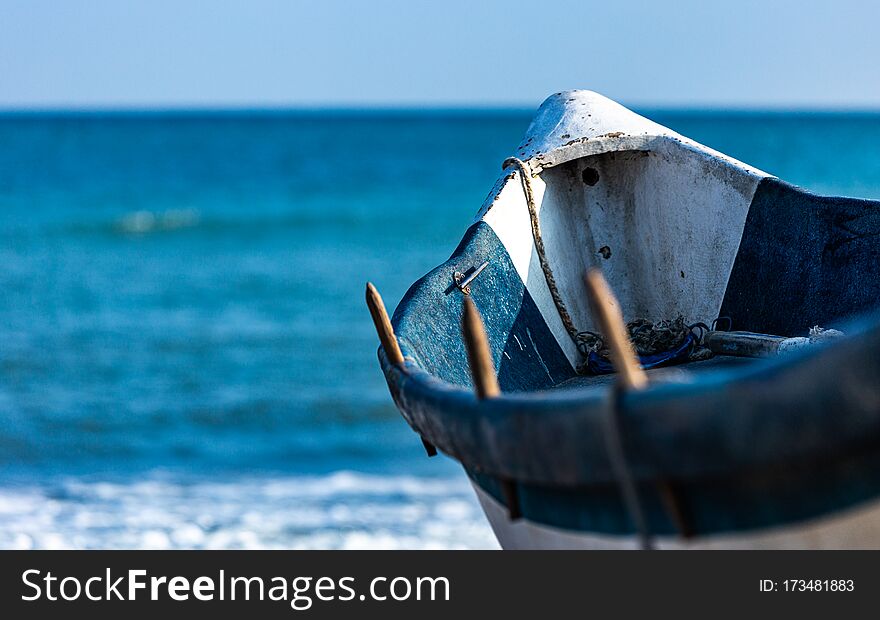 Close-up of a fishing boat interior with the sea in the background. Close-up of a fishing boat interior with the sea in the background