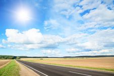 Asphalt Road In Green Meadow Royalty Free Stock Photos Asphalt Road In Green Meadow Royalty Free Stock Photos