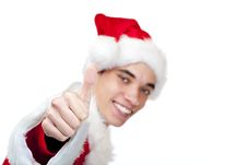 Smiling Male Santa Claus Teenager Shows Thumb Up Royalty Free Stock Photography