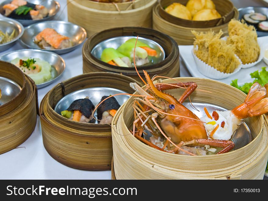 Chinese steamed dimsum and food on table. Chinese steamed dimsum and food on table