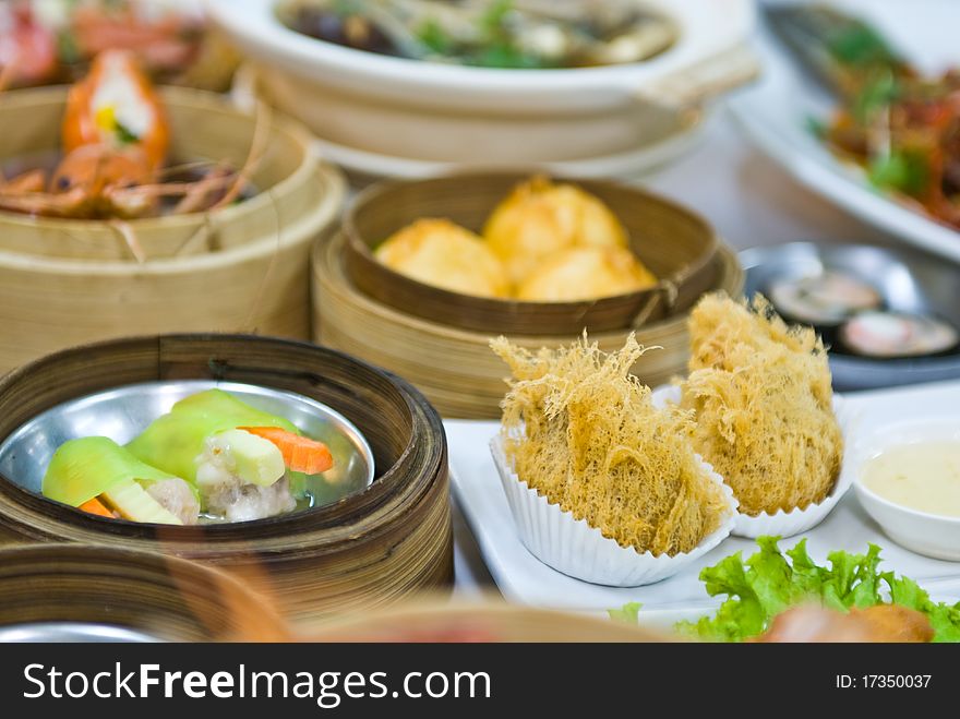 Chinese steamed dimsum and food on table. Chinese steamed dimsum and food on table