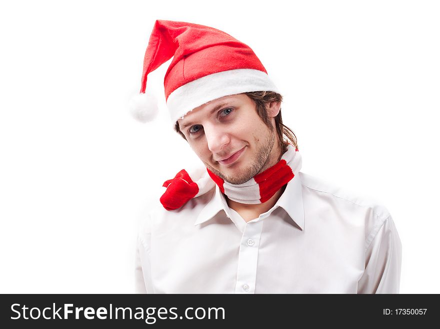 Young man in the Santa Claus hat, isolated on a white background