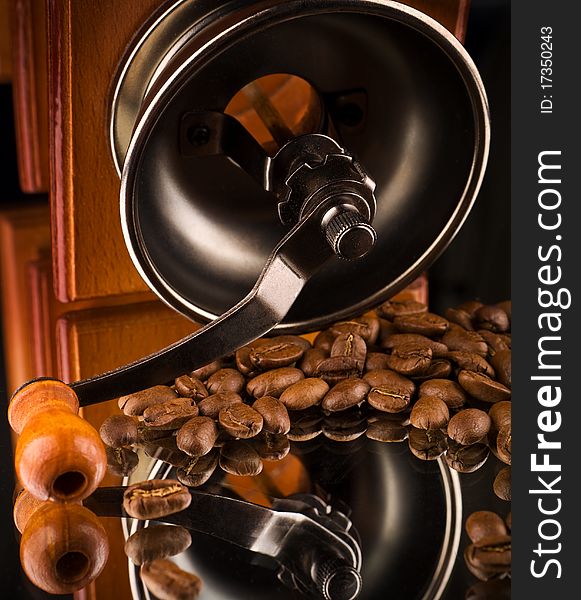 Manual coffee mill with coffee beans. Manual coffee mill with coffee beans