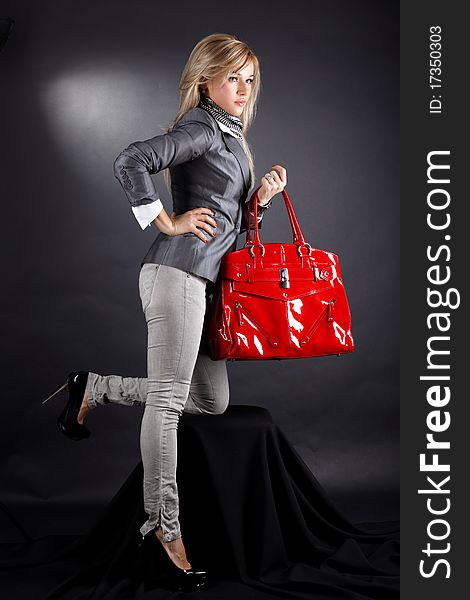 Woman With Red Bag