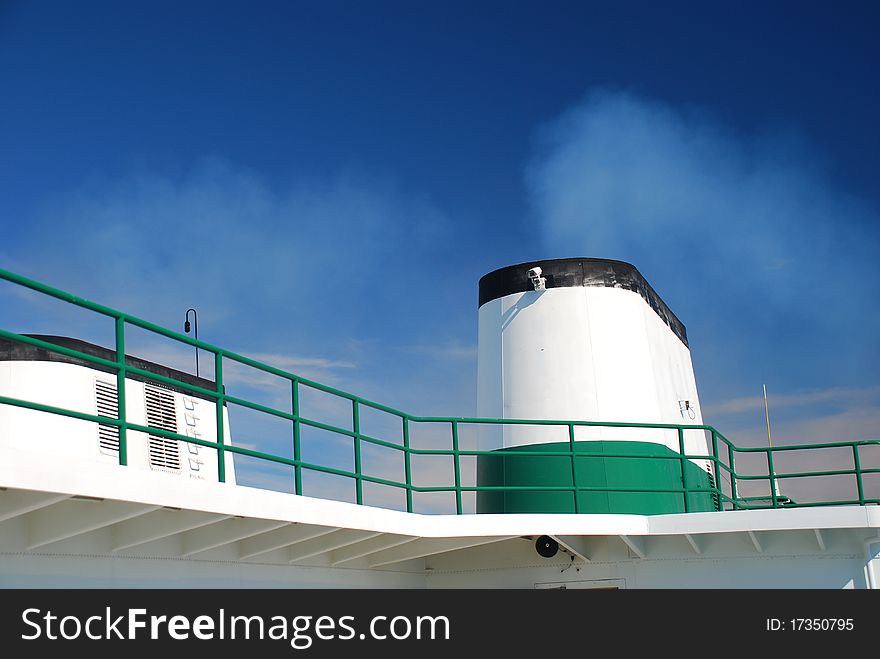 Boat chimney steam on blue sky