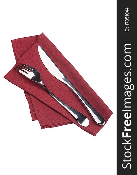 Knife and fork on a napkin as a dining room serving.