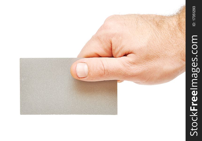 Closeup image of businessman's hand holding blank paper business card on white. Closeup image of businessman's hand holding blank paper business card on white