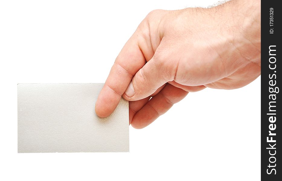 Closeup image of businessman's hand holding blank paper business card on white. Closeup image of businessman's hand holding blank paper business card on white