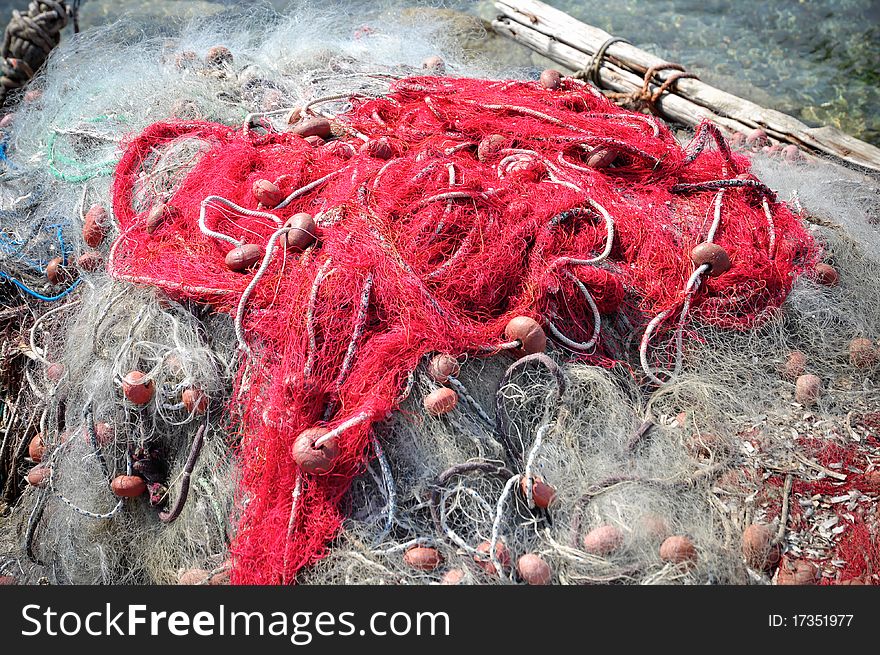 Red fishing net. Sardinia. Italy.