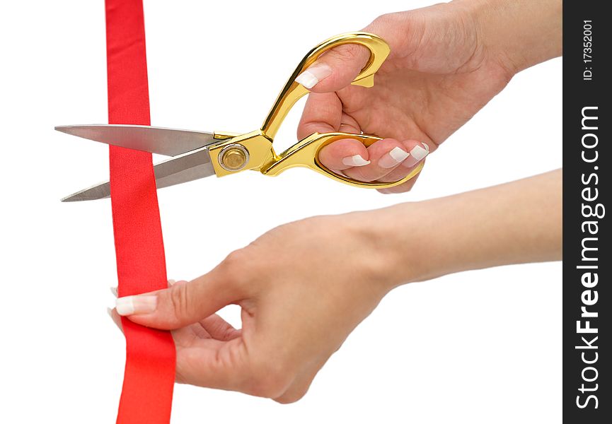 Hands of woman with scissors and red line isolated
