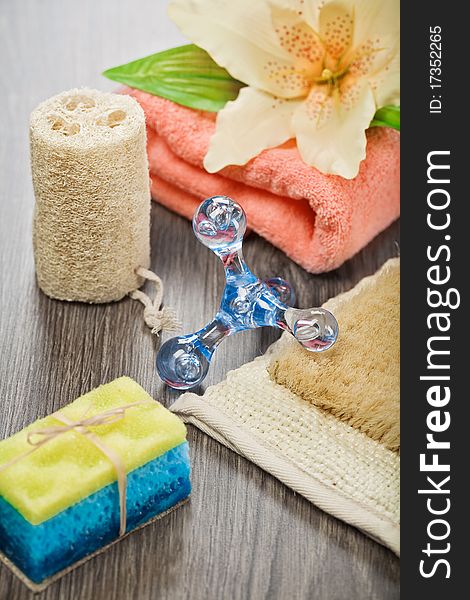 Accessories for taking bath on wooden background