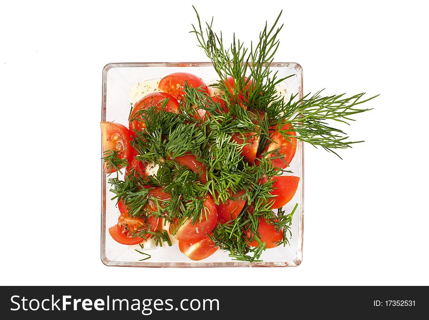 Salad from fresh vegetables on a white background