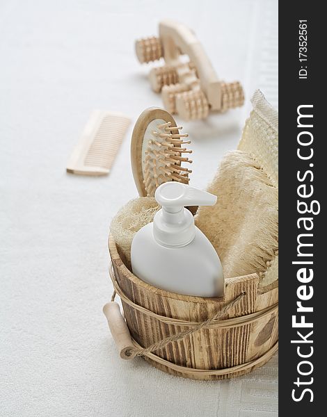 Big collection of objects for bathing on white towel