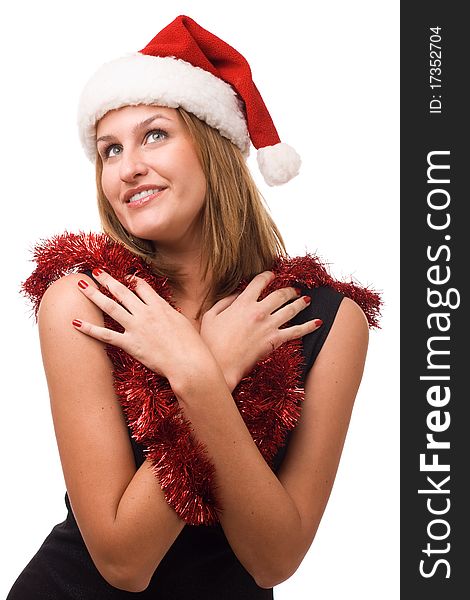 Smiling women in Santa's hat. Studio shot.