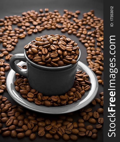 Coffee composition of grain and cup