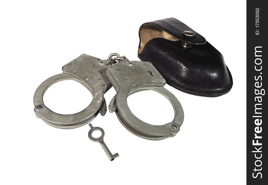 Handcuffs, key, and cover for handcuffsr on a white background