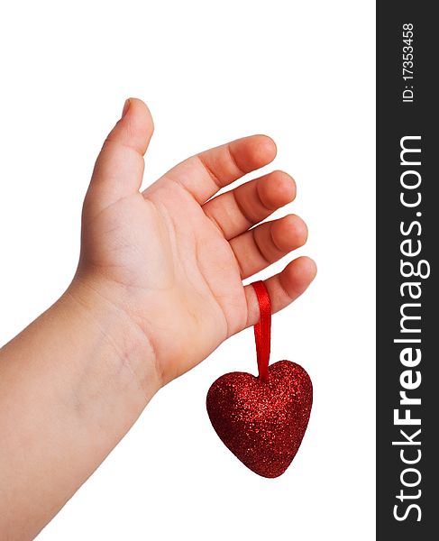 Red heart in the children's arm, white background