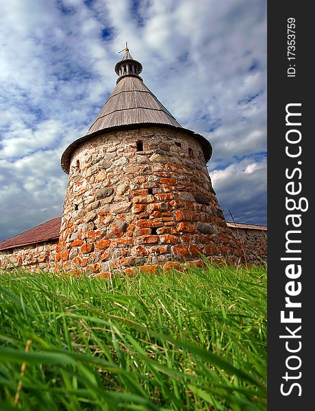 Old defensive tower and grass