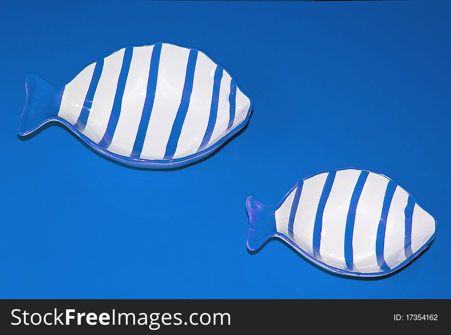 Two blue fishes in a imaginarium blue sea