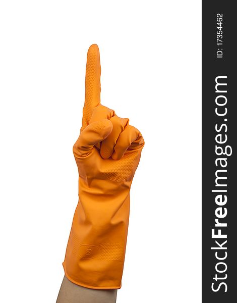 A Hand with orange protective glove pointing with a finger. A Hand with orange protective glove pointing with a finger