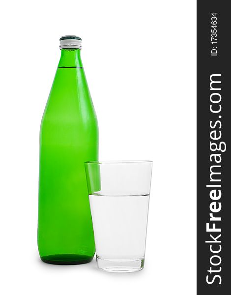 Green bottle and glass with water isolated on white background