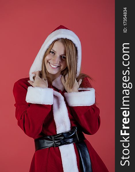 Christmas girl on red background