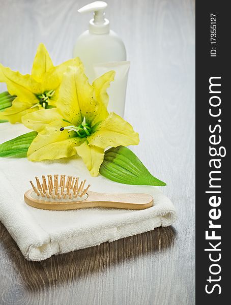 Articles for bathing on wooden background